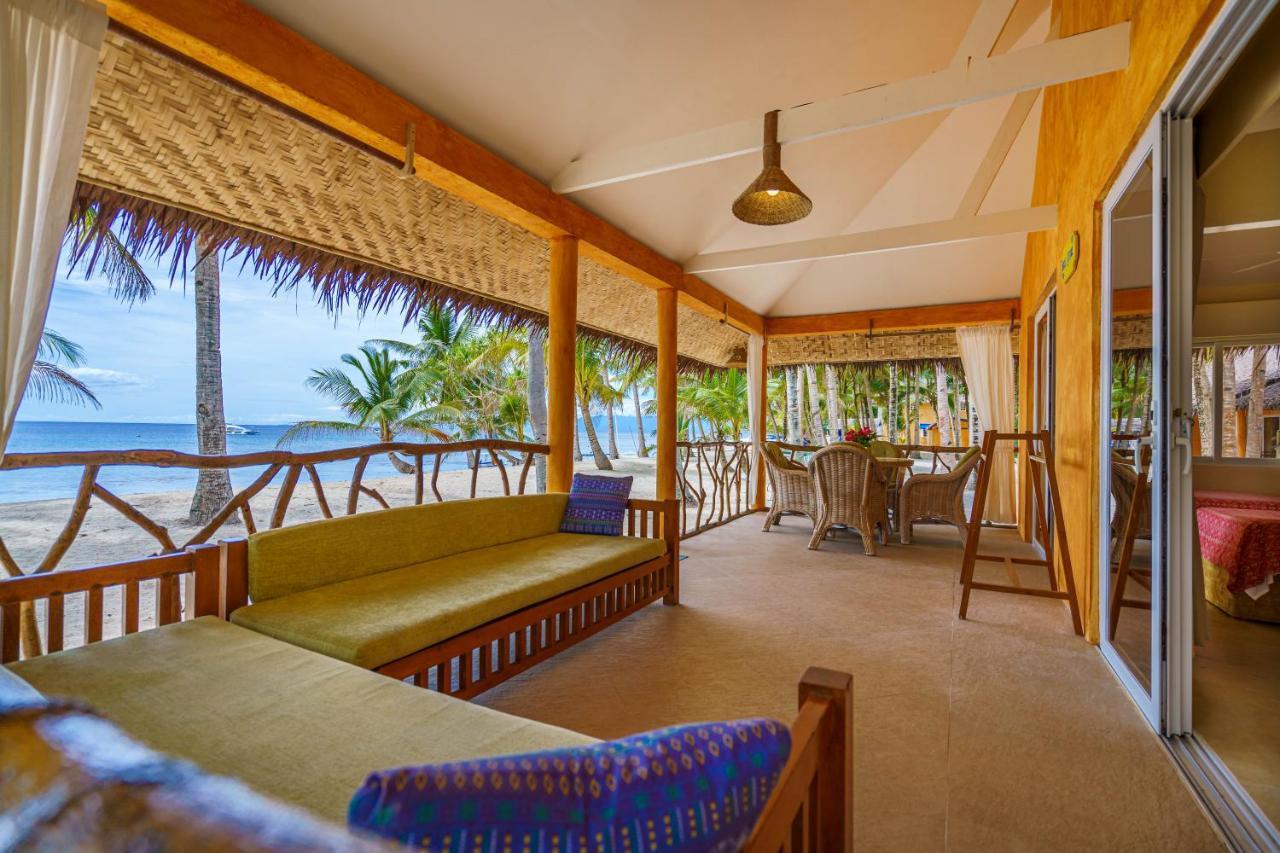 Coco Grove Beach Resort, Siquijor Island Ngoại thất bức ảnh A view of the beach from the hotel