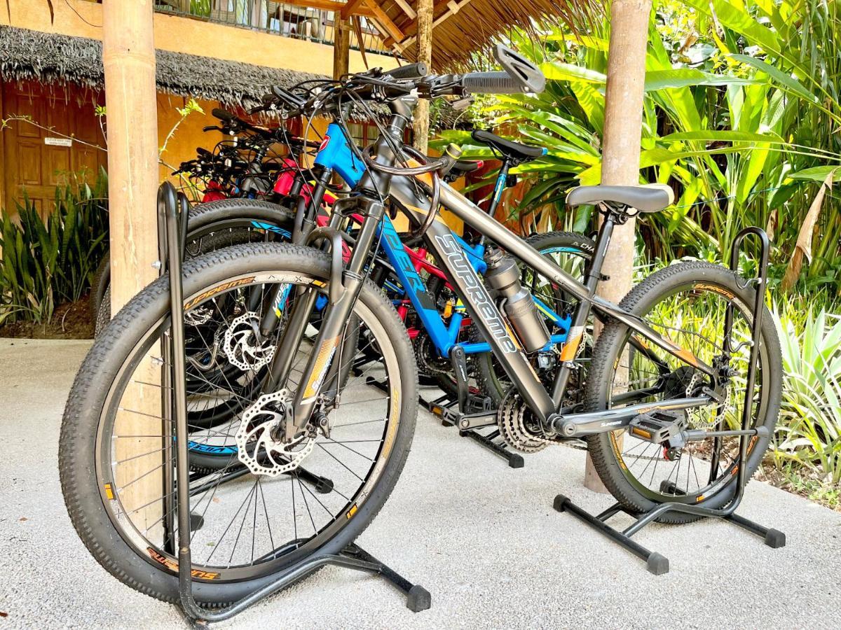 Coco Grove Beach Resort, Siquijor Island Ngoại thất bức ảnh A bicycle on a bike stand